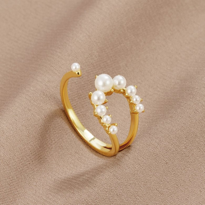 Elegant See-saw Pearl Ring