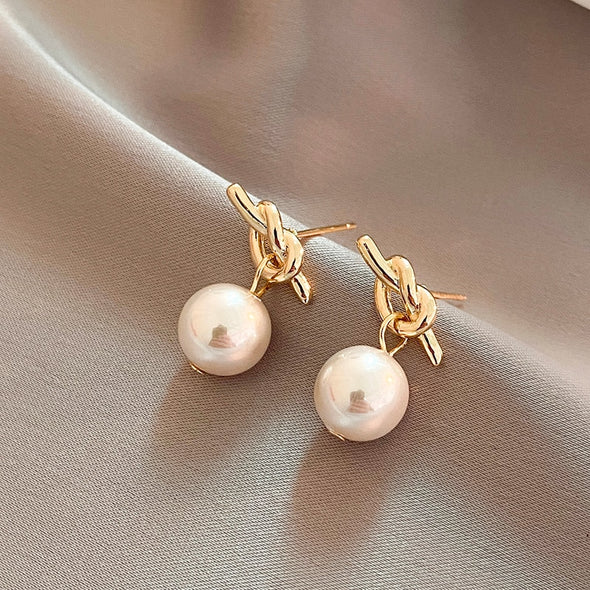 Elegant Pearl Bow Earrings