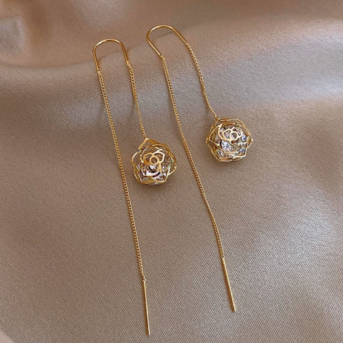 Dangling Sphere Earrings in Gold