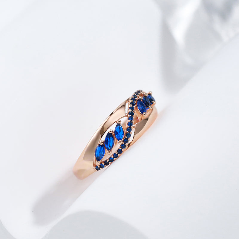 Golden Ring with Blue Crystal