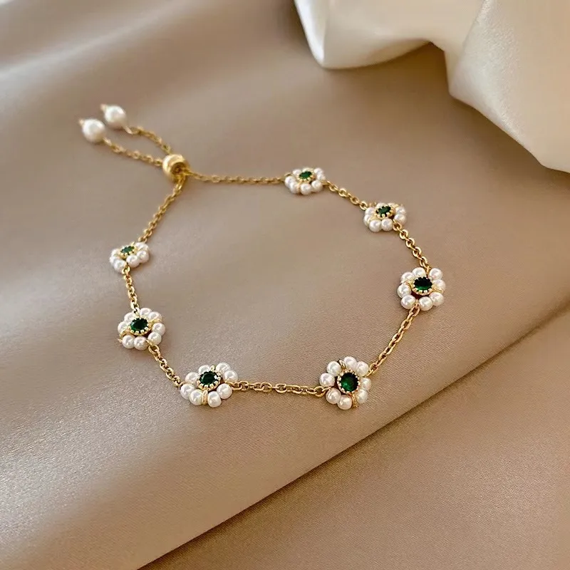 Elegant Daisy Bracelet with Green Crystals